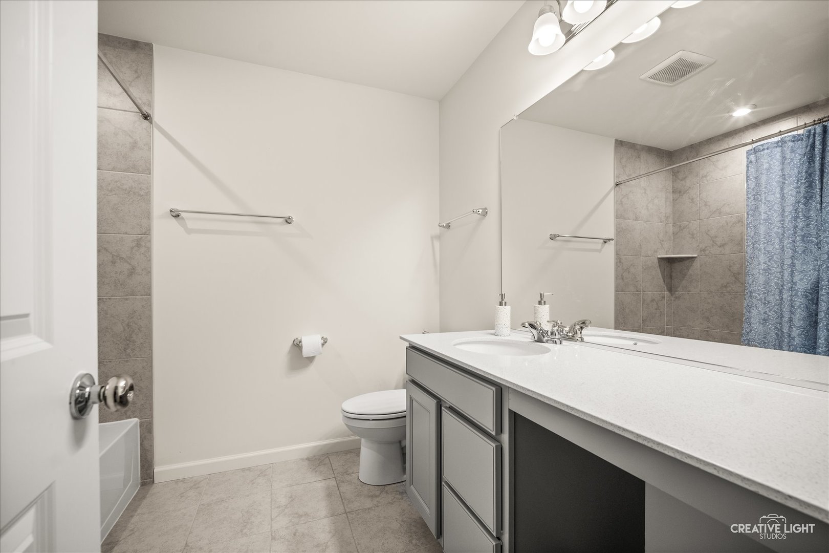 3667 Peregrine Way Elgin, IL 60124 - Photo 20 of 35 a bathroom with a sink a toilet and shower