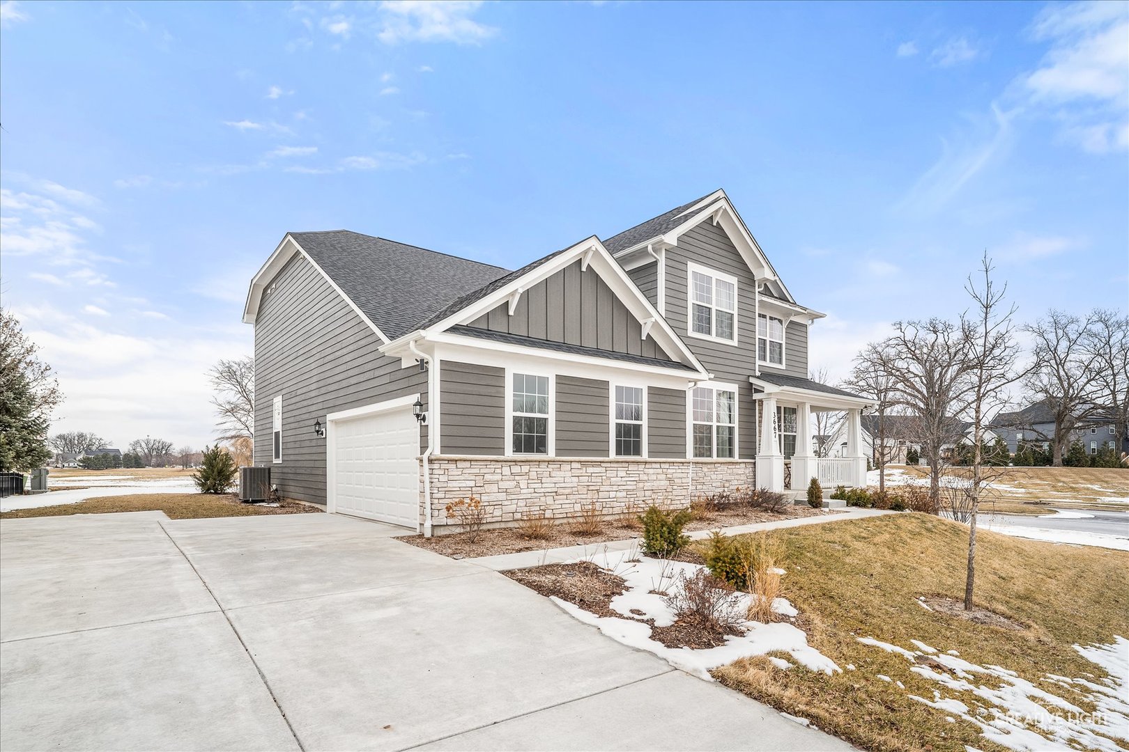 3667 Peregrine Way Elgin, IL 60124 - Photo 2 of 35 a front view of a house with a yard