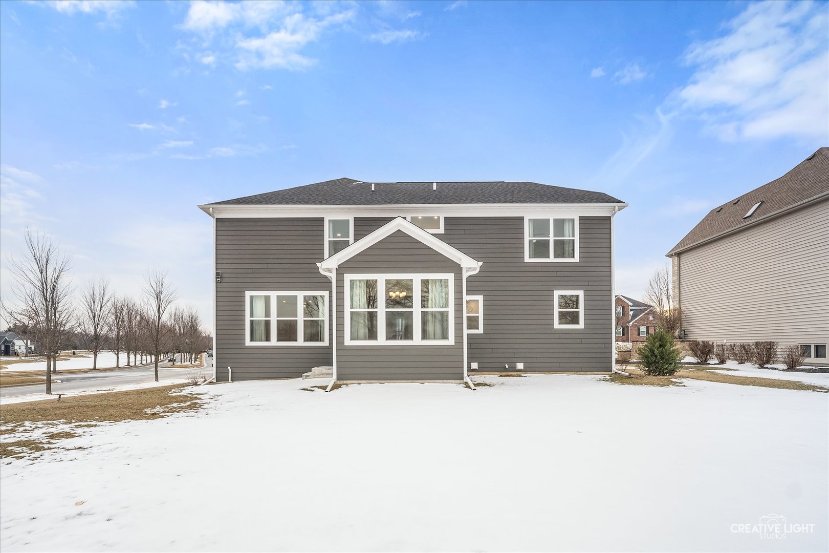 3667 Peregrine Way Elgin, IL 60124 - Photo 28 of 35 a front view of a house with a yard
