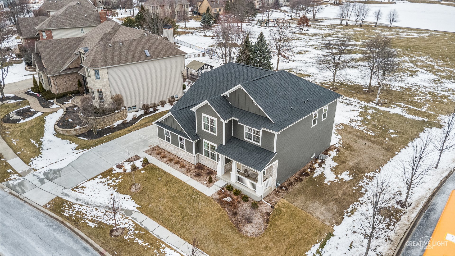 3667 Peregrine Way Elgin, IL 60124 - Photo 29 of 35 an aerial view of a house with a yard