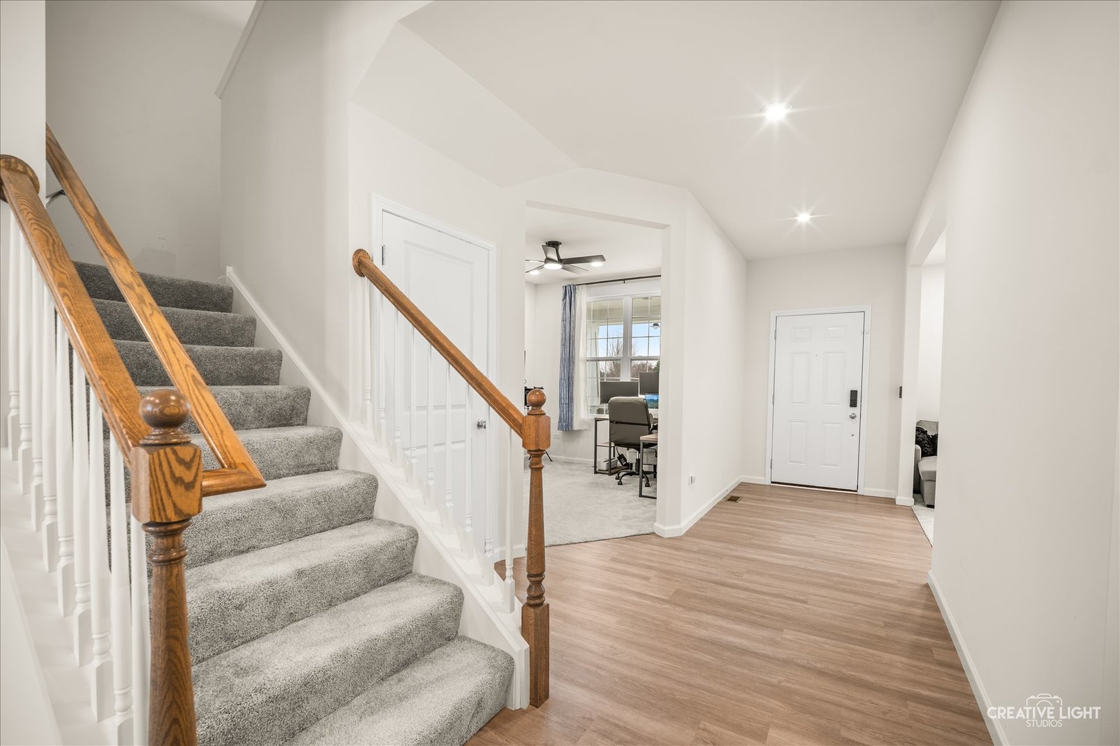 3667 Peregrine Way Elgin, IL 60124 - Photo 3 of 35 a view of entryway and hall with wooden floor