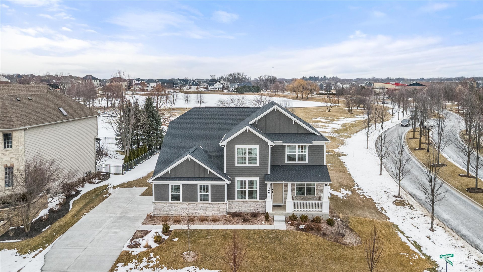 3667 Peregrine Way Elgin, IL 60124 - Photo 32 of 35 an aerial view of a house with a yard