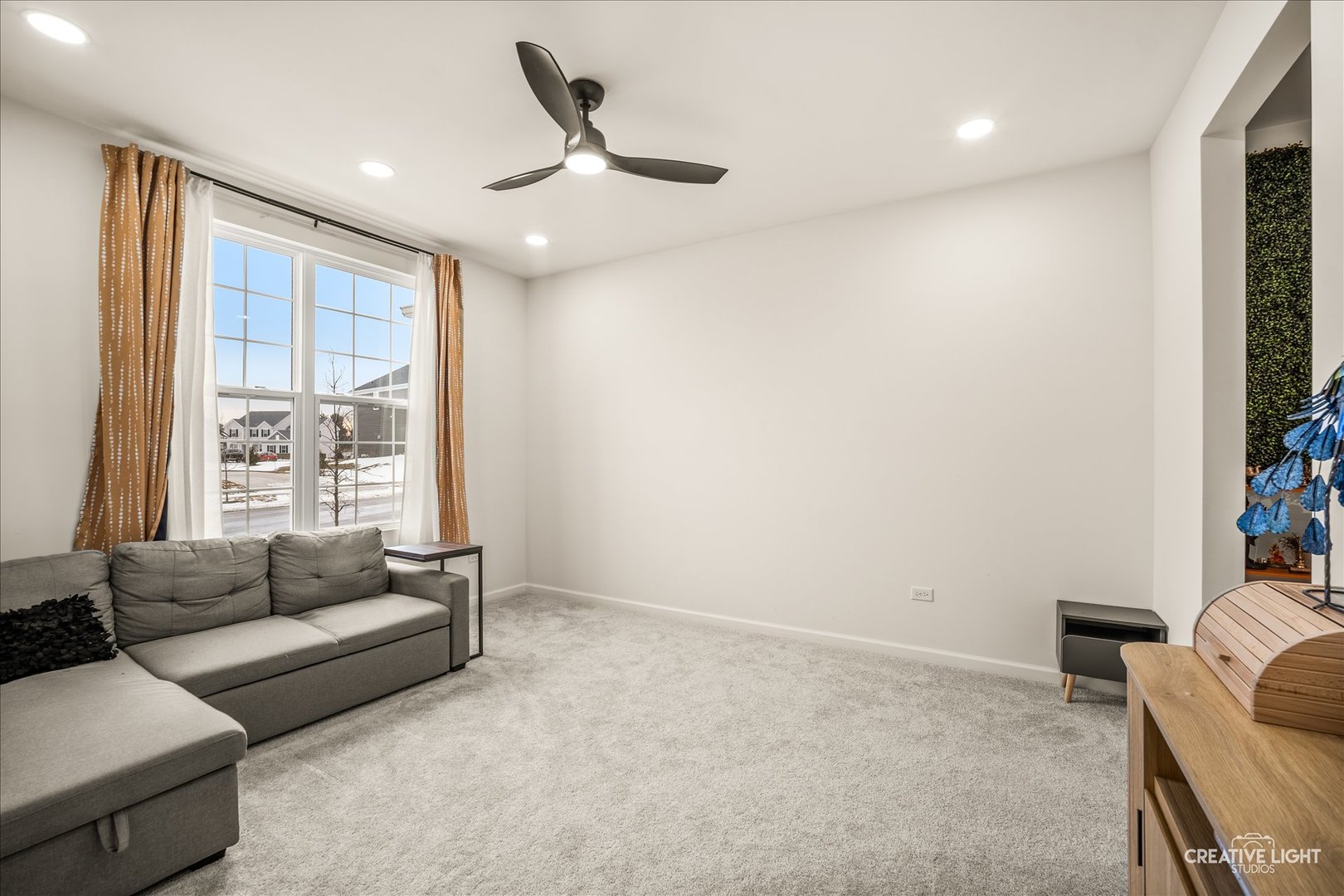 3667 Peregrine Way Elgin, IL 60124 - Photo 4 of 35 a living room with furniture and a large window