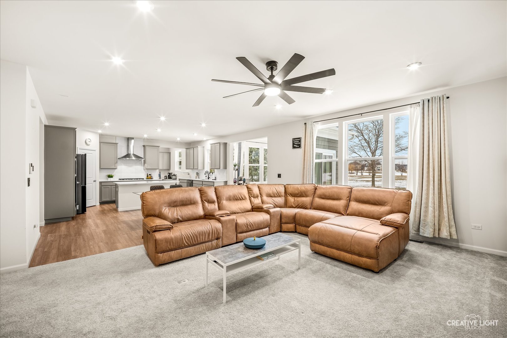 3667 Peregrine Way Elgin, IL 60124 - Photo 8 of 35 a living room with furniture and a large window