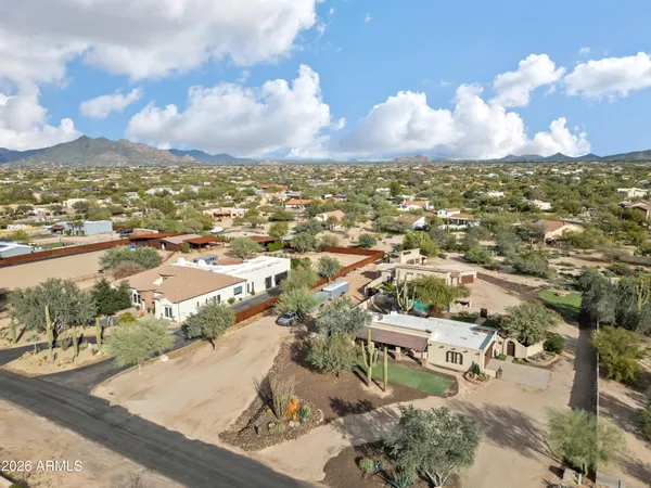 an aerial view of a building with outdoor space