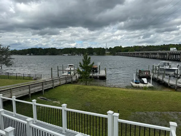 a view of a lake with a garden