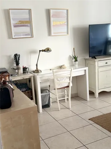 a work place that has a chair and a table in it