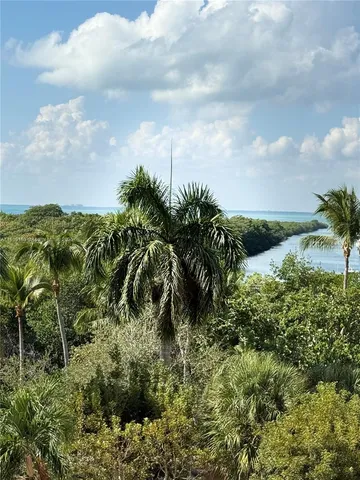 a view of a wooden deck with furniture