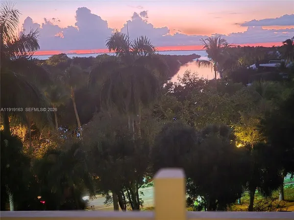 a view of balcony with furniture