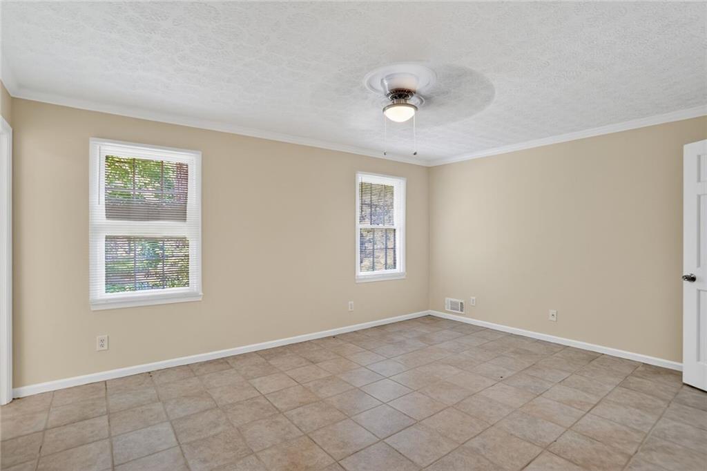 2817 Thornridge Drive Atlanta, GA 30340 - Photo 11 of 15 an empty room with windows