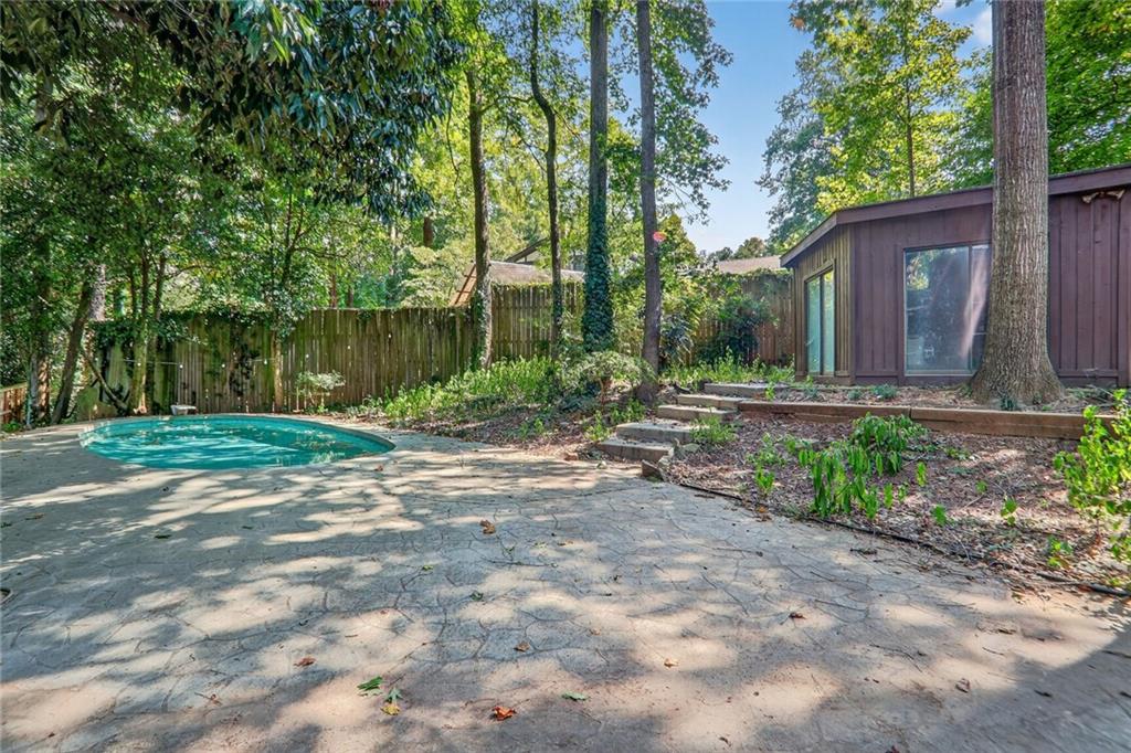 2817 Thornridge Drive Atlanta, GA 30340 - Photo 15 of 15 a backyard of a house with lots of green space
