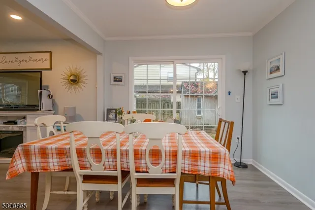 a bedroom with a bed a table and chair