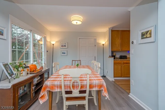 a bedroom with a bed and a table in it