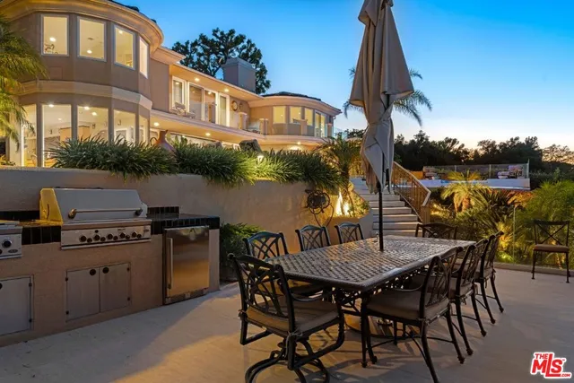 a front view of a house with a yard and a garage
