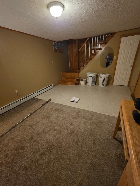 478 Tucker Street Fall River, MA 02721 - Photo 22 of 38 a view of an empty room with wooden floor