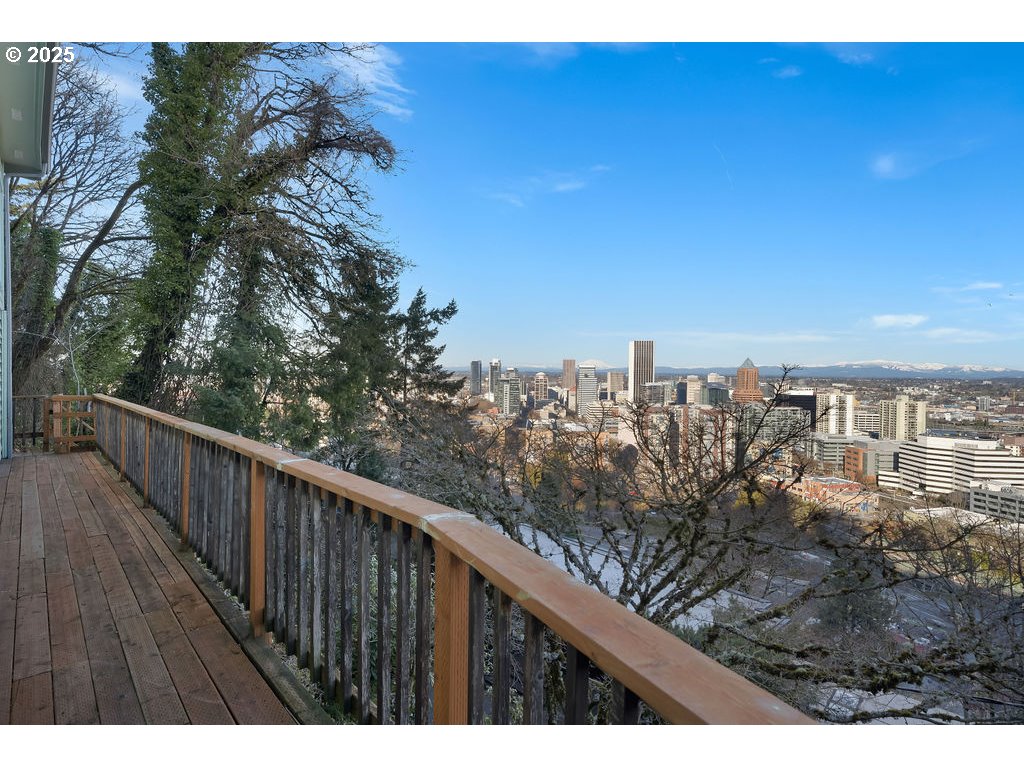 2604 Southwest Buckingham Avenue Portland, OR 97201 - Photo 19 of 32 a view of a city from a balcony