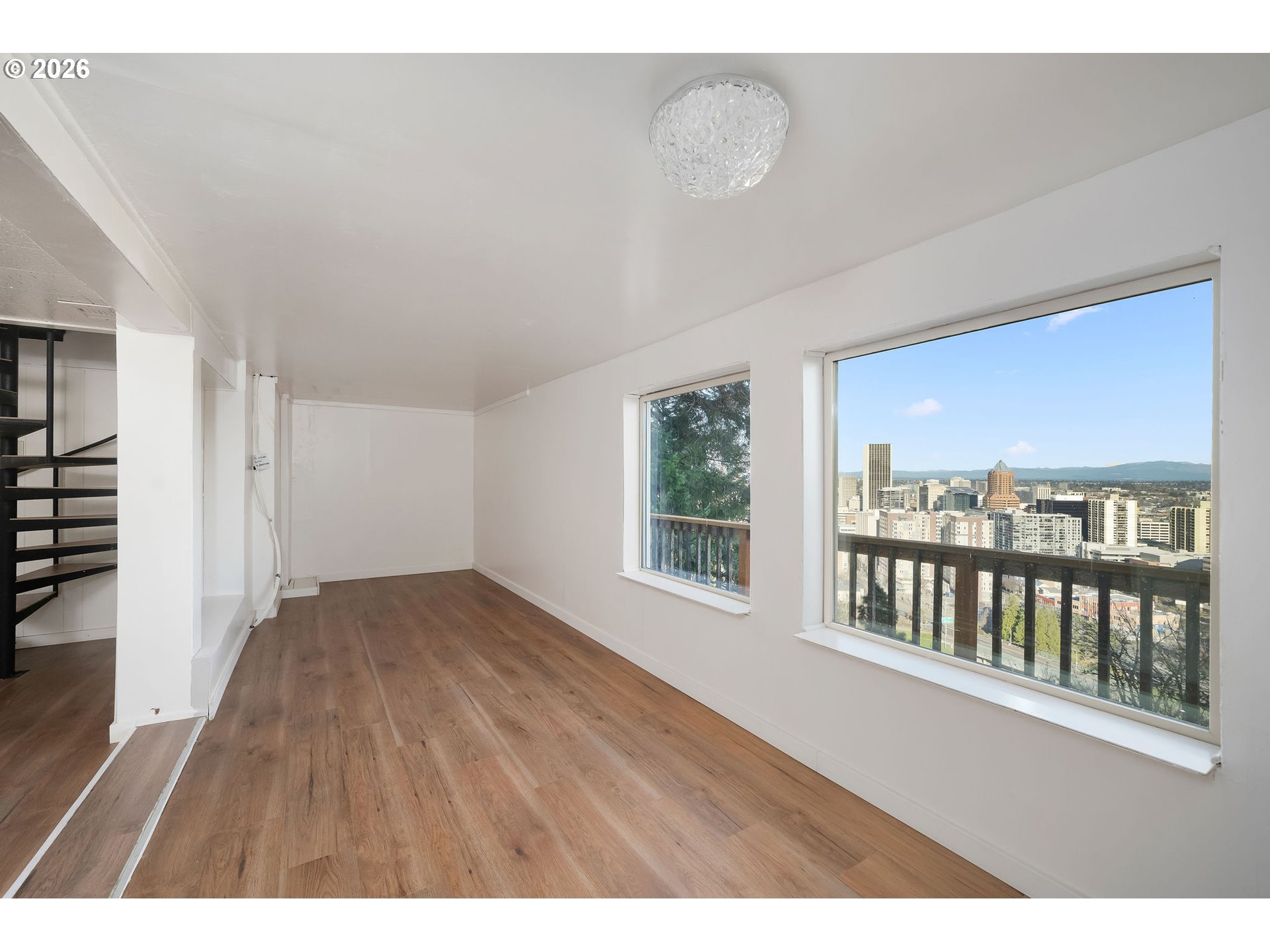 2604 Southwest Buckingham Avenue Portland, OR 97201 - Photo 28 of 32 a view interior of a house with wooden floor