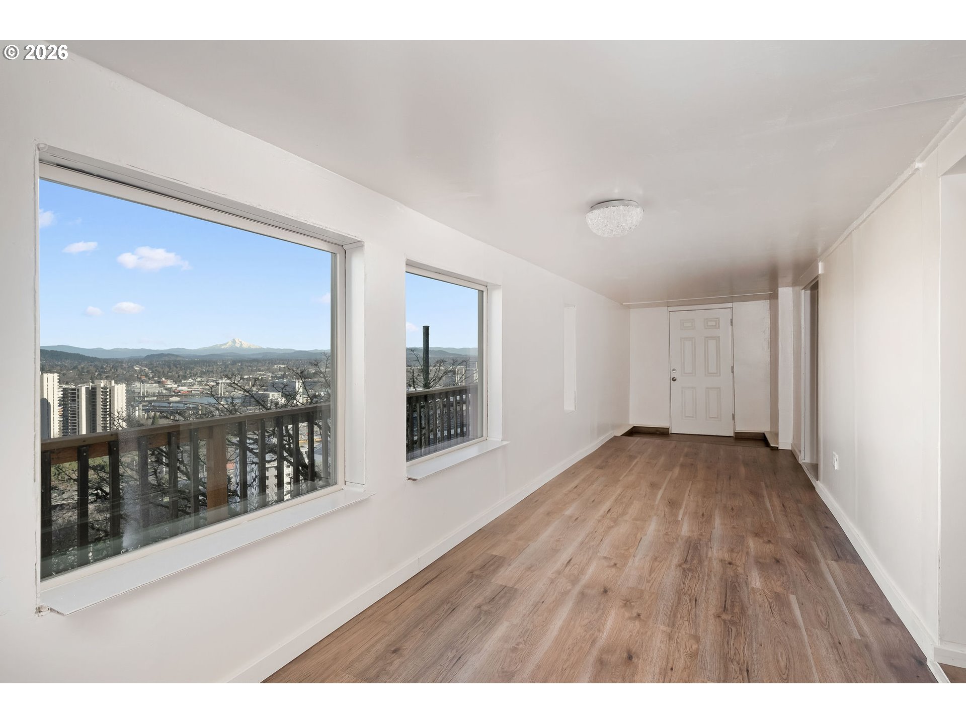 2604 Southwest Buckingham Avenue Portland, OR 97201 - Photo 29 of 32 a view interior of a house wooden floor and windows