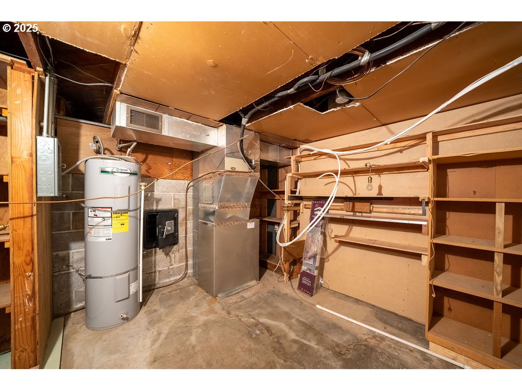 2604 Southwest Buckingham Avenue Portland, OR 97201 - Photo 30 of 32 a view of walk in closet with clothes and shoes