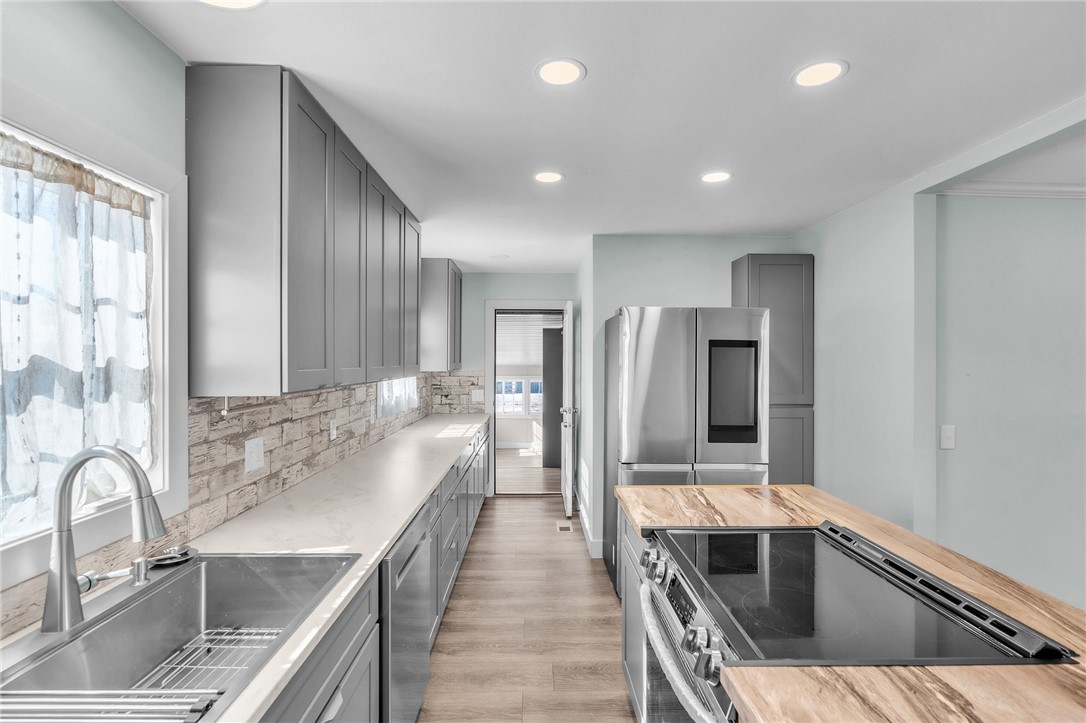 2038 Avant Circle Anderson, SC 29625 - Photo 11 of 32 This modern kitchen features sleek appliances and ample counter space for all your culinary endeavors.