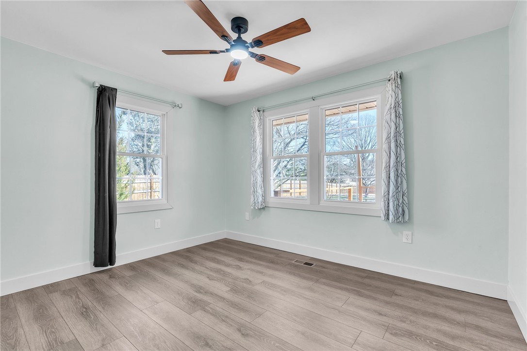 2038 Avant Circle Anderson, SC 29625 - Photo 15 of 32 This airy room features ample natural light and modern flooring, creating a serene and inviting atmosphere.