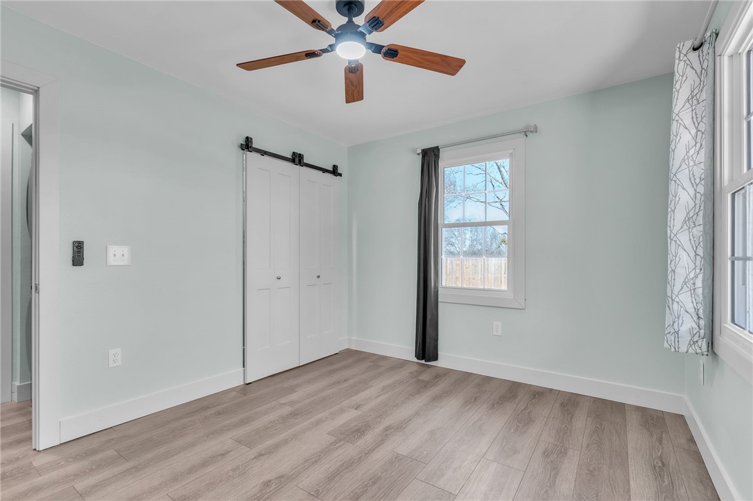 2038 Avant Circle Anderson, SC 29625 - Photo 16 of 32 This tranquil bedroom offers comfort and style with warm wood flooring.