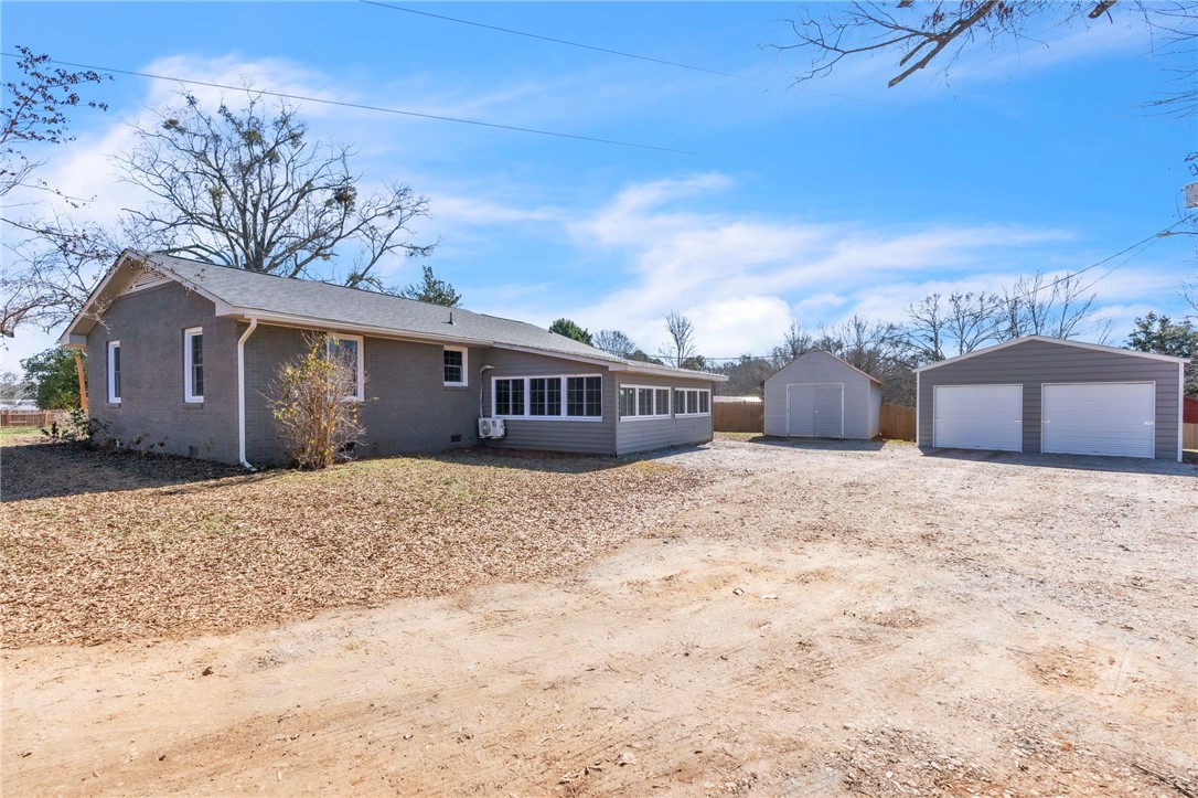 2038 Avant Circle Anderson, SC 29625 - Photo 2 of 32 This charming home offers ample outdoor space with additional storage buildings.