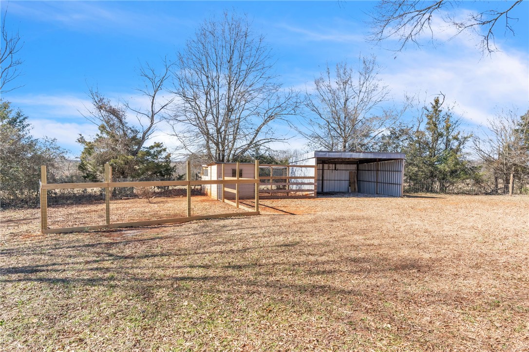 2038 Avant Circle Anderson, SC 29625 - Photo 23 of 32 This expansive yard features ample space and essential outbuildings, perfect for various outdoor pursuits.