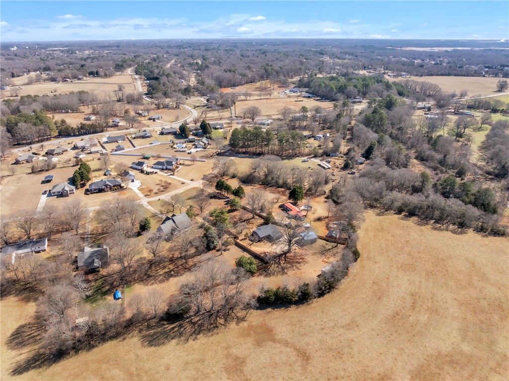 2038 Avant Circle Anderson, SC 29625 - Photo 29 of 32 This expansive aerial view showcases a peaceful rural community with abundant natural beauty.