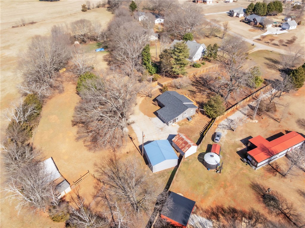 2038 Avant Circle Anderson, SC 29625 - Photo 31 of 32 This expansive aerial view showcases a property with diverse structures and ample outdoor space.