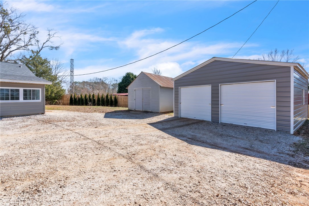 2038 Avant Circle Anderson, SC 29625 - Photo 5 of 32 This property features multiple outbuildings, providing ample storage and utility.