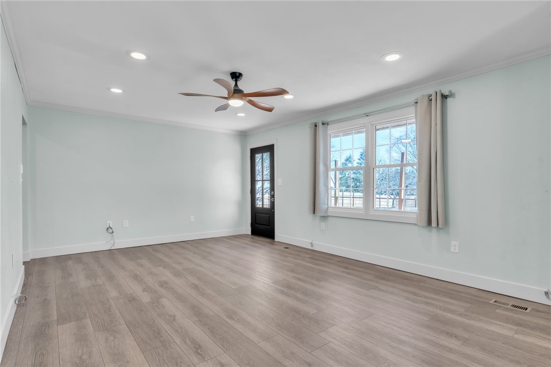 2038 Avant Circle Anderson, SC 29625 - Photo 7 of 32 This bright living area features modern recessed lighting and durable wood flooring.