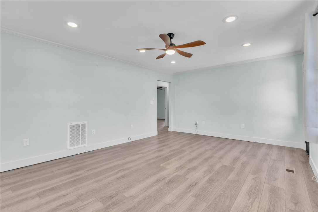 2038 Avant Circle Anderson, SC 29625 - Photo 8 of 32 This airy room features durable flooring, offering a versatile space for diverse arrangements.
