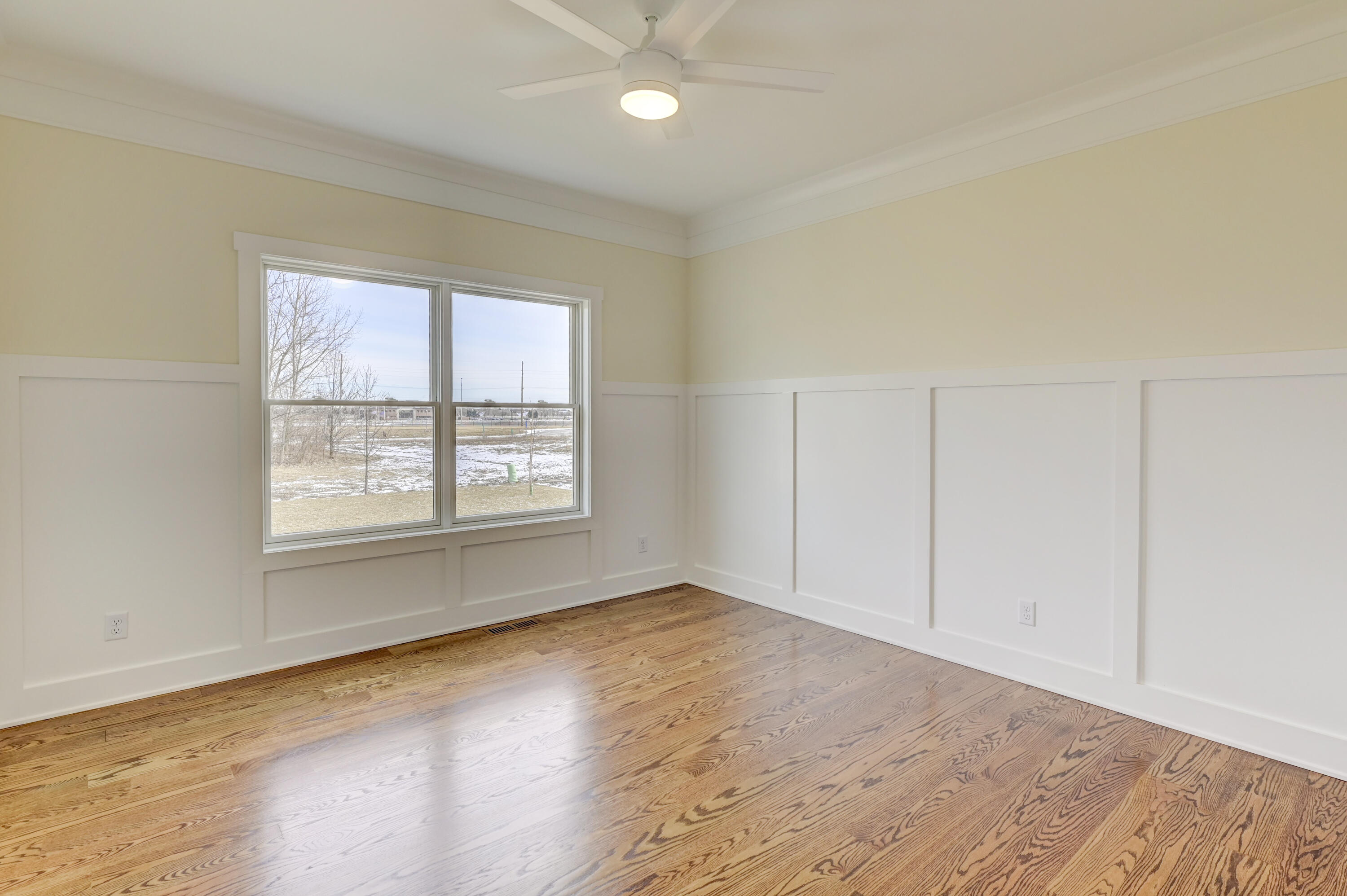 10155 Barbara Lane Munster, IN 46321 - Photo 16 of 36 an empty room with wooden floor and windows