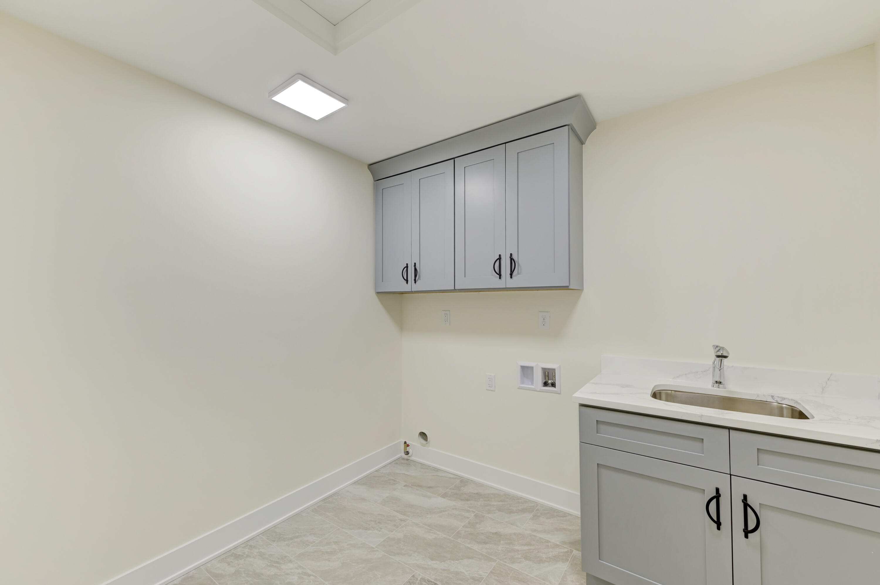 10155 Barbara Lane Munster, IN 46321 - Photo 21 of 36 a view of storage and utility room with cabinets
