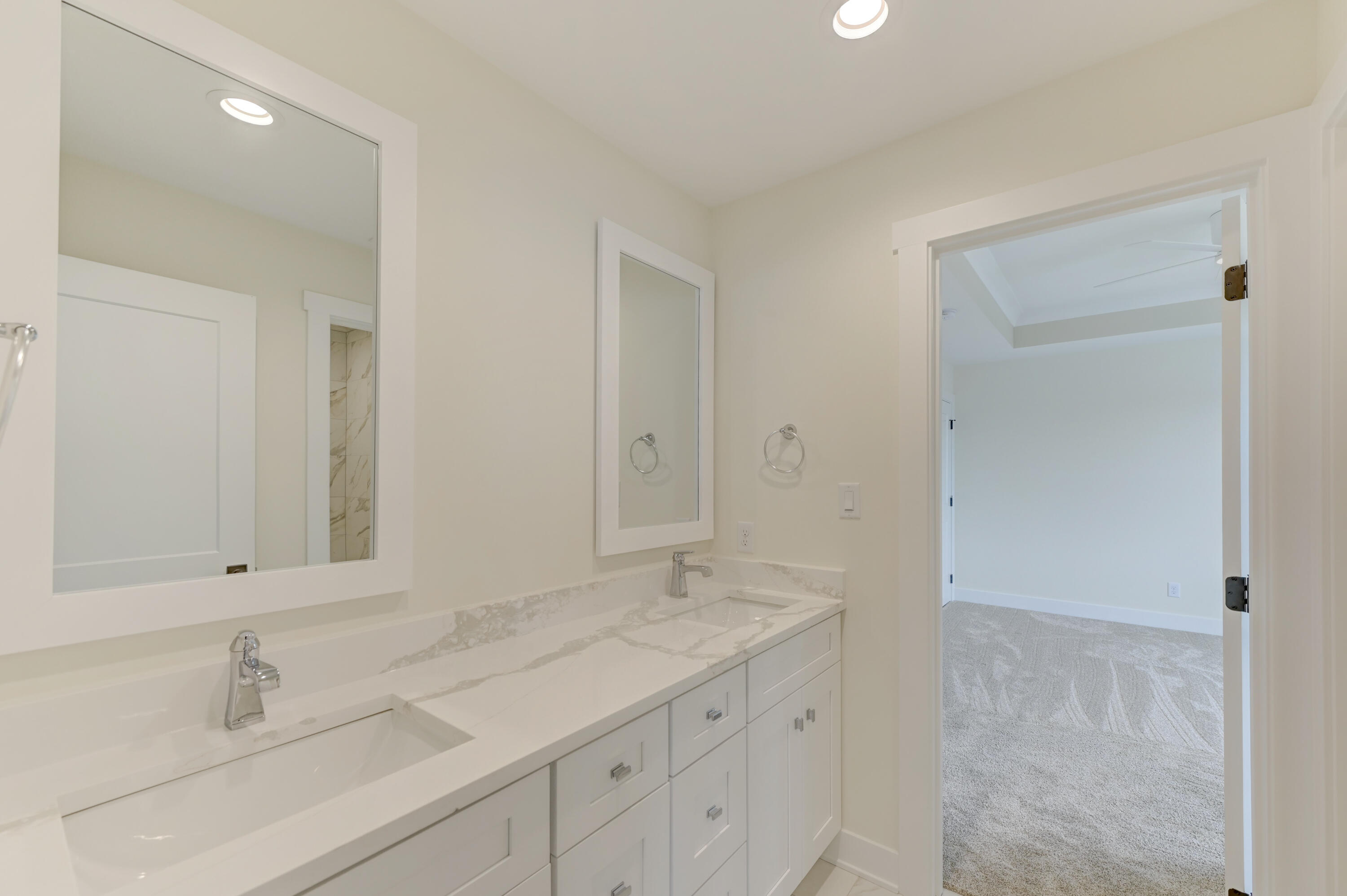 10155 Barbara Lane Munster, IN 46321 - Photo 23 of 36 a bathroom with a sink and a mirror