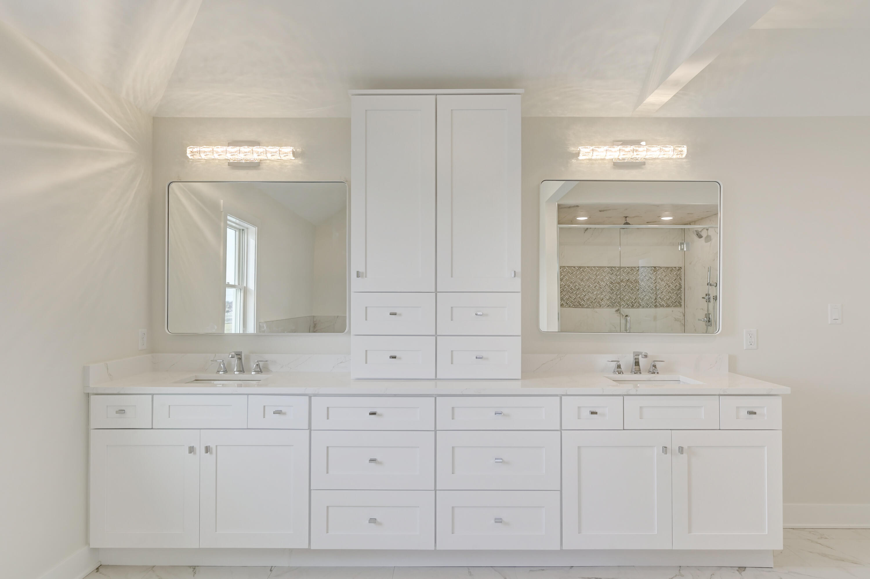 10155 Barbara Lane Munster, IN 46321 - Photo 28 of 36 a bathroom with white cabinets sink and mirror