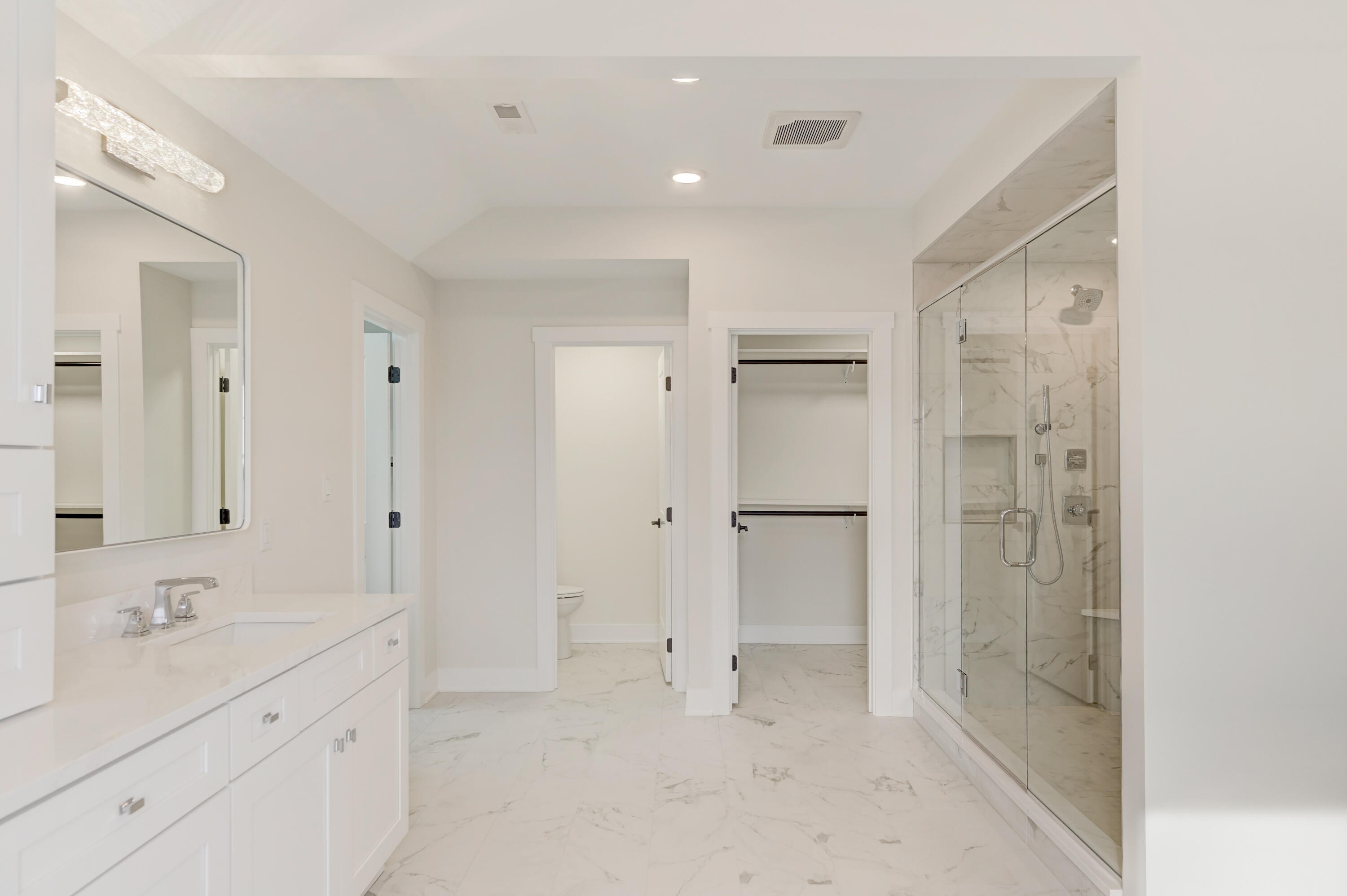 10155 Barbara Lane Munster, IN 46321 - Photo 30 of 36 a bathroom with a double vanity sink shower and a mirror