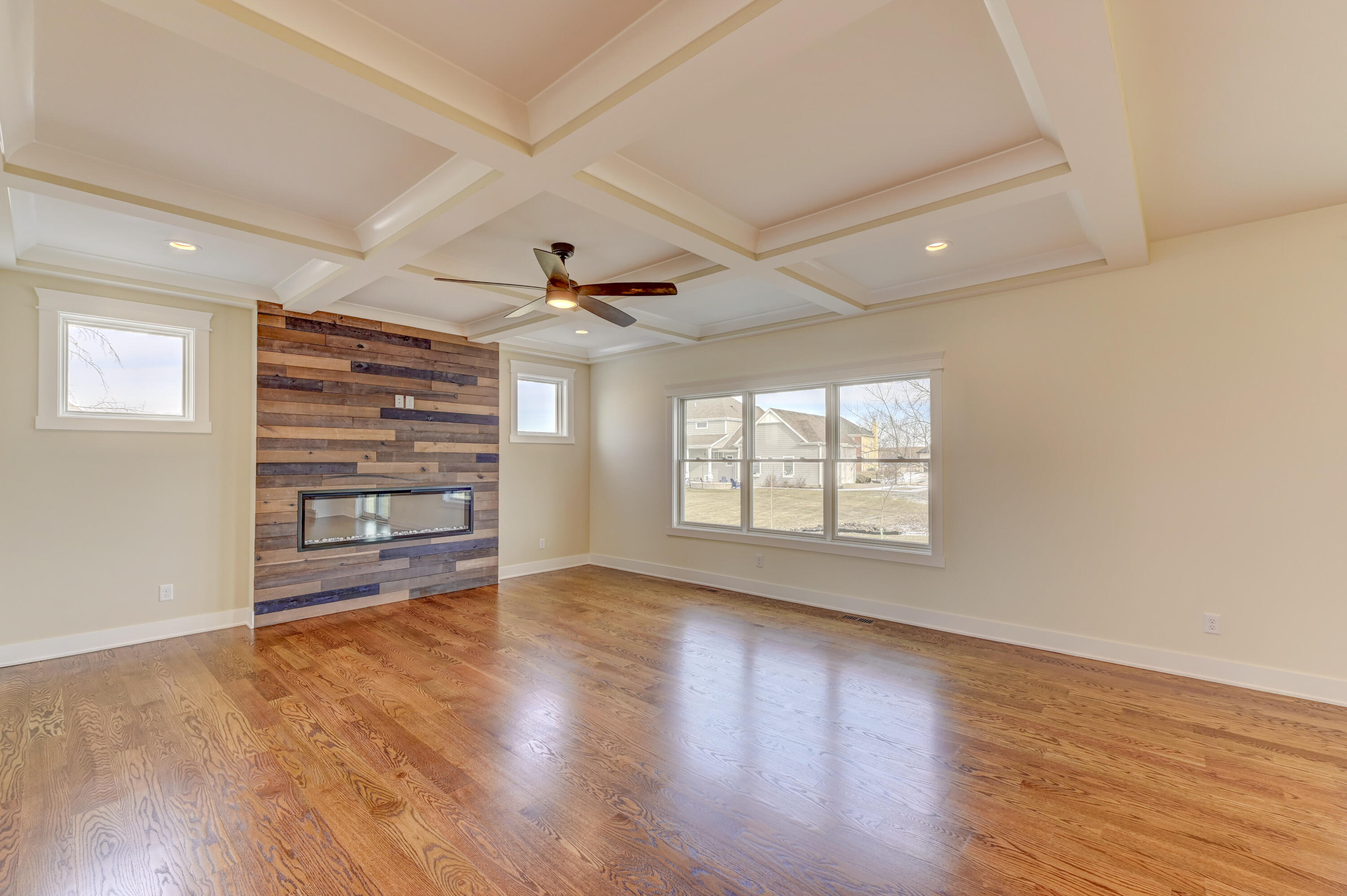 10155 Barbara Lane Munster, IN 46321 - Photo 6 of 36 wooden floor in an empty room with a window