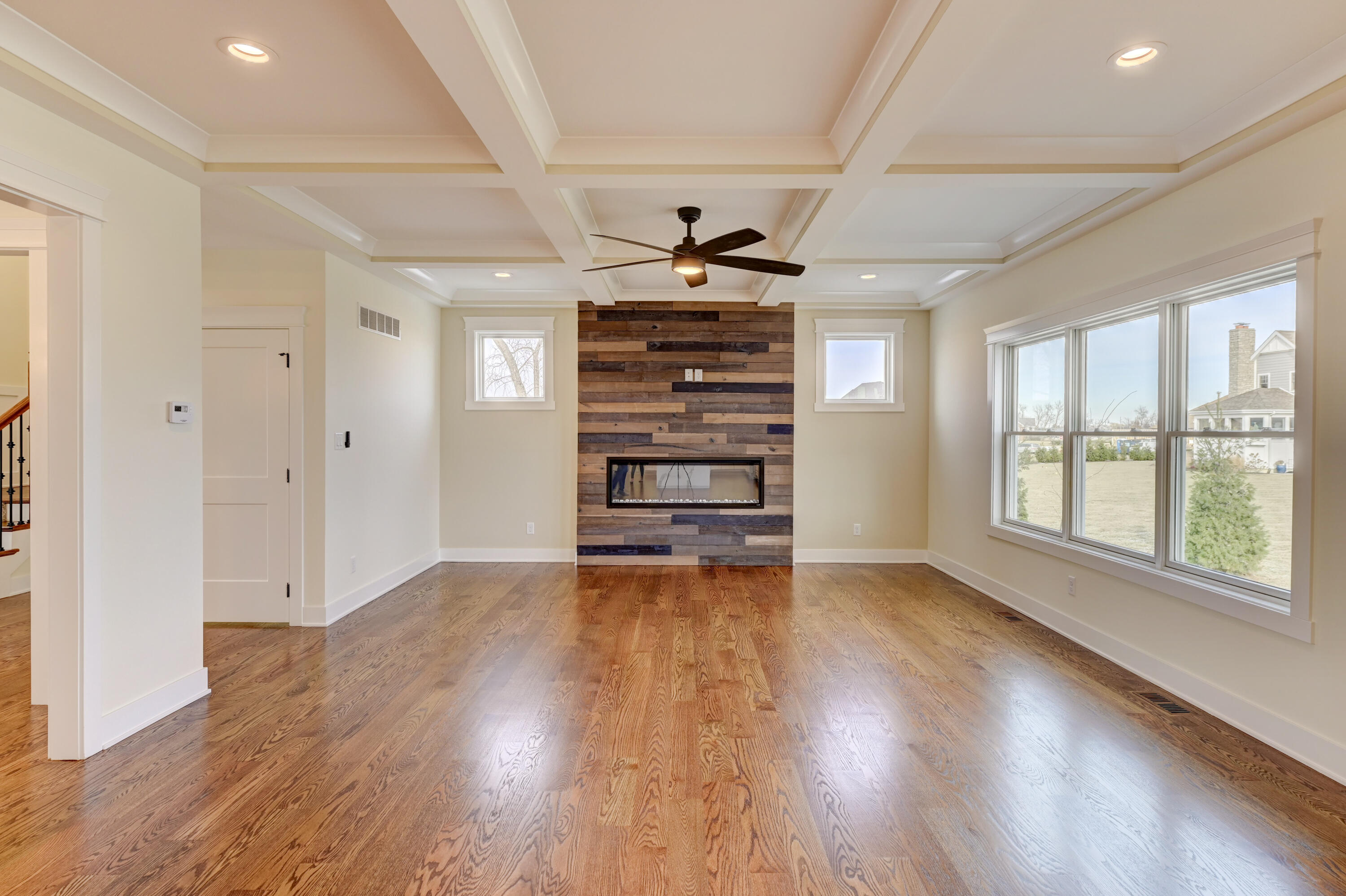 10155 Barbara Lane Munster, IN 46321 - Photo 7 of 36 wooden floor in an empty room with a window