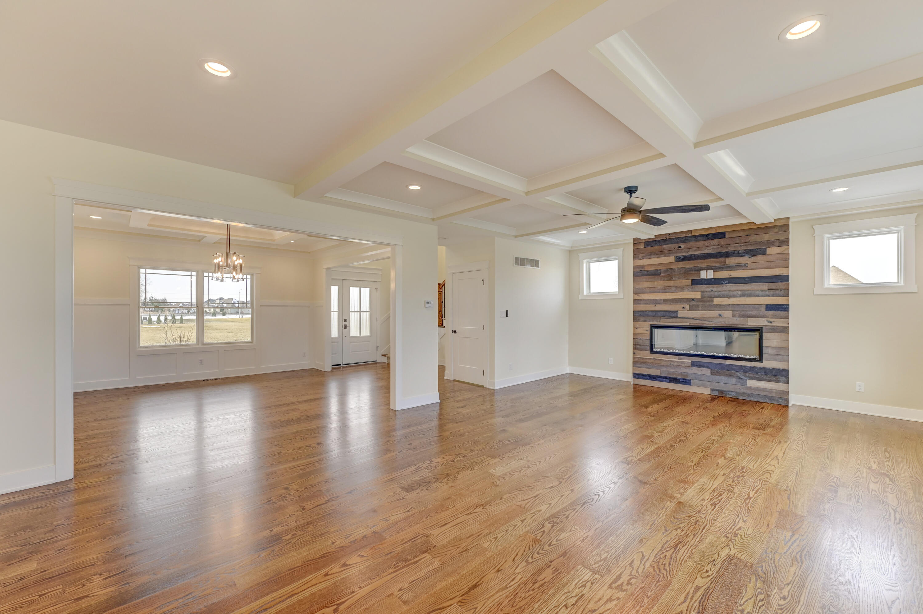 10155 Barbara Lane Munster, IN 46321 - Photo 8 of 36 a view of empty room with wooden floor and window