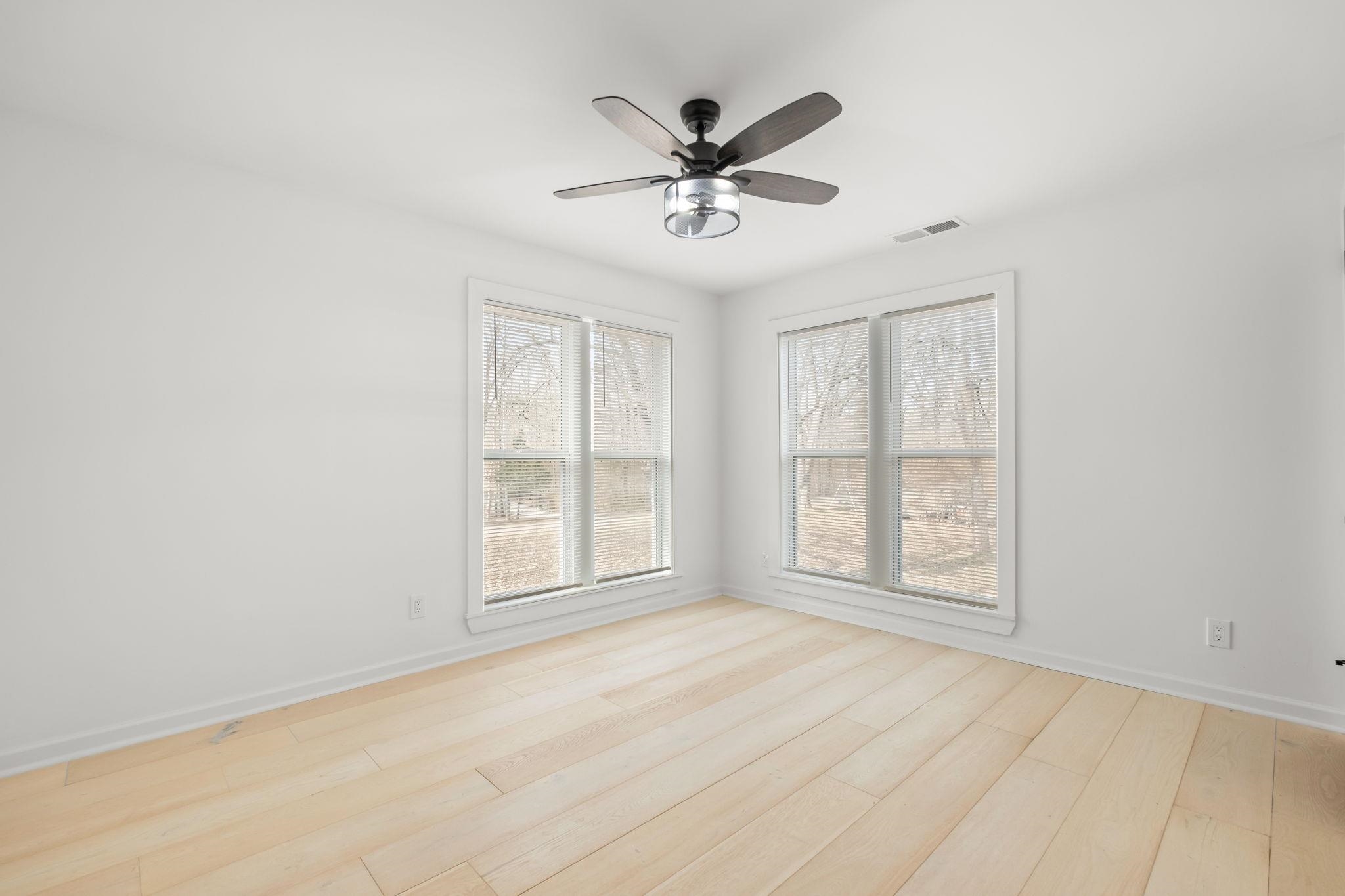6224 Benjestown Road Memphis, TN 38127 - Photo 17 of 38 Spare room featuring light wood-type flooring and a ceiling fan