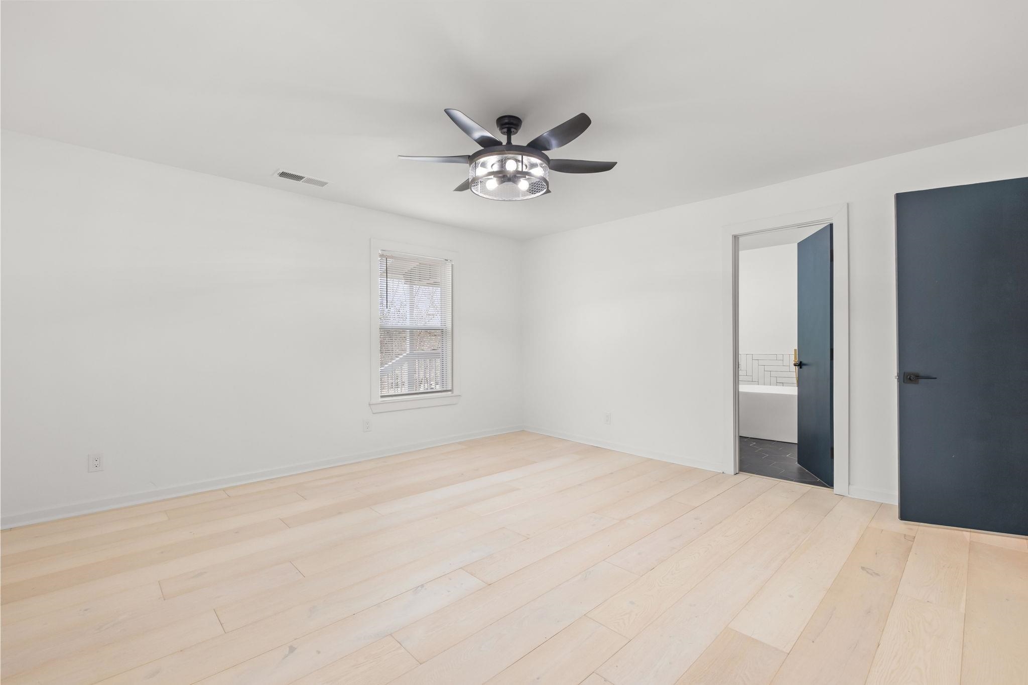 6224 Benjestown Road Memphis, TN 38127 - Photo 18 of 38 Spare room with a ceiling fan and light wood-style floors