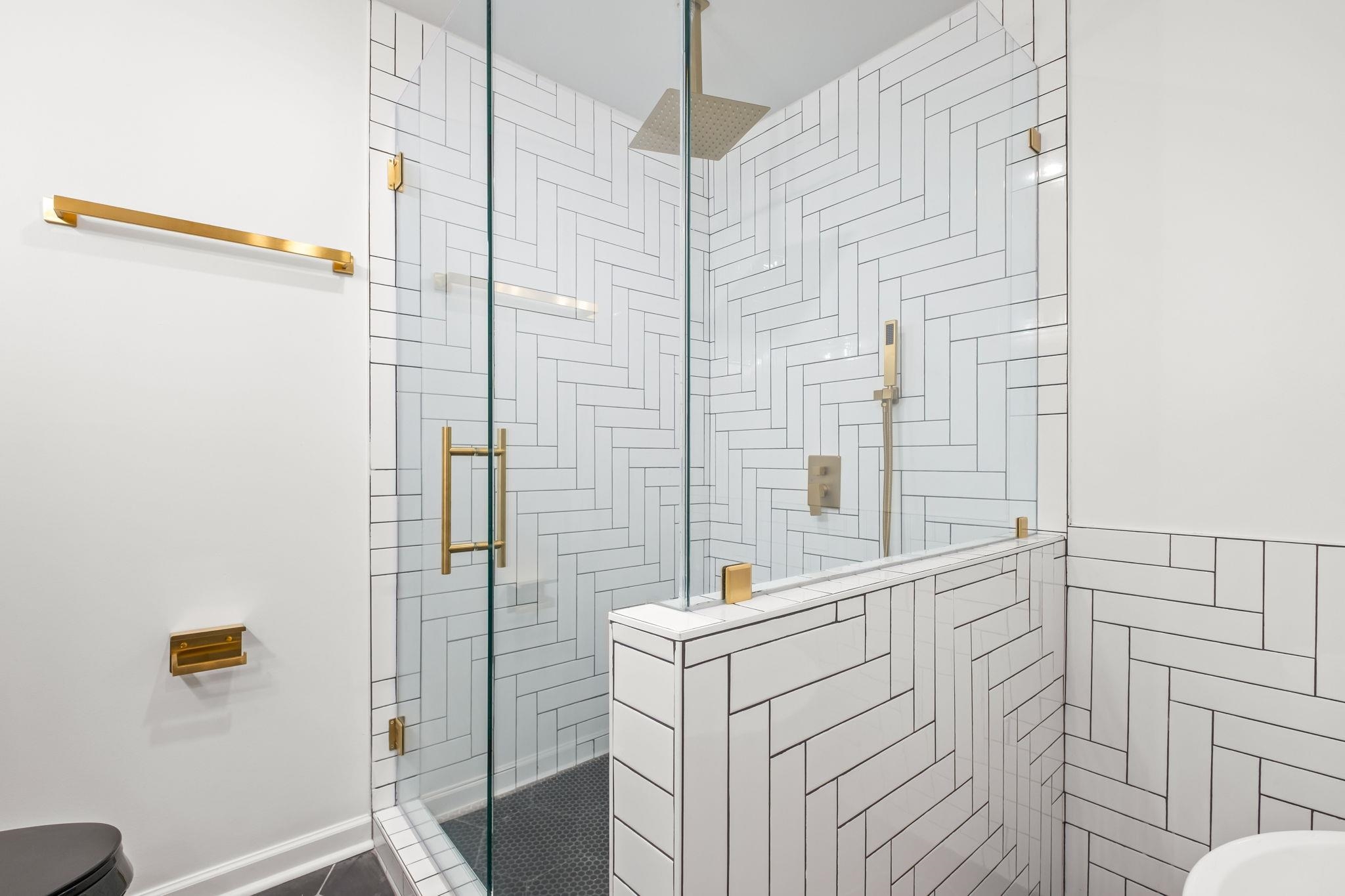 6224 Benjestown Road Memphis, TN 38127 - Photo 22 of 38 Bathroom featuring a shower stall and toilet