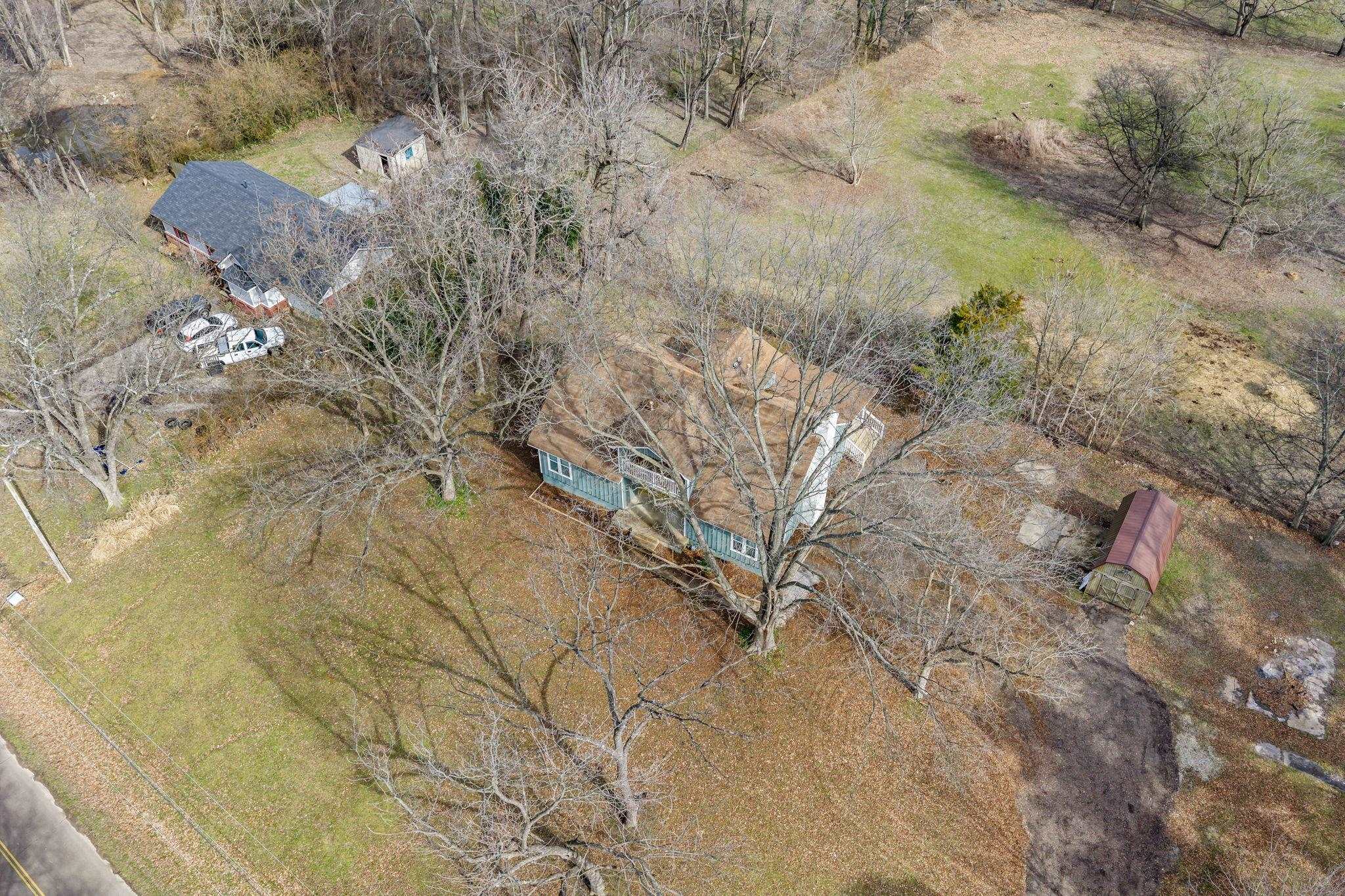 6224 Benjestown Road Memphis, TN 38127 - Photo 3 of 38 a view of a tree with a yard