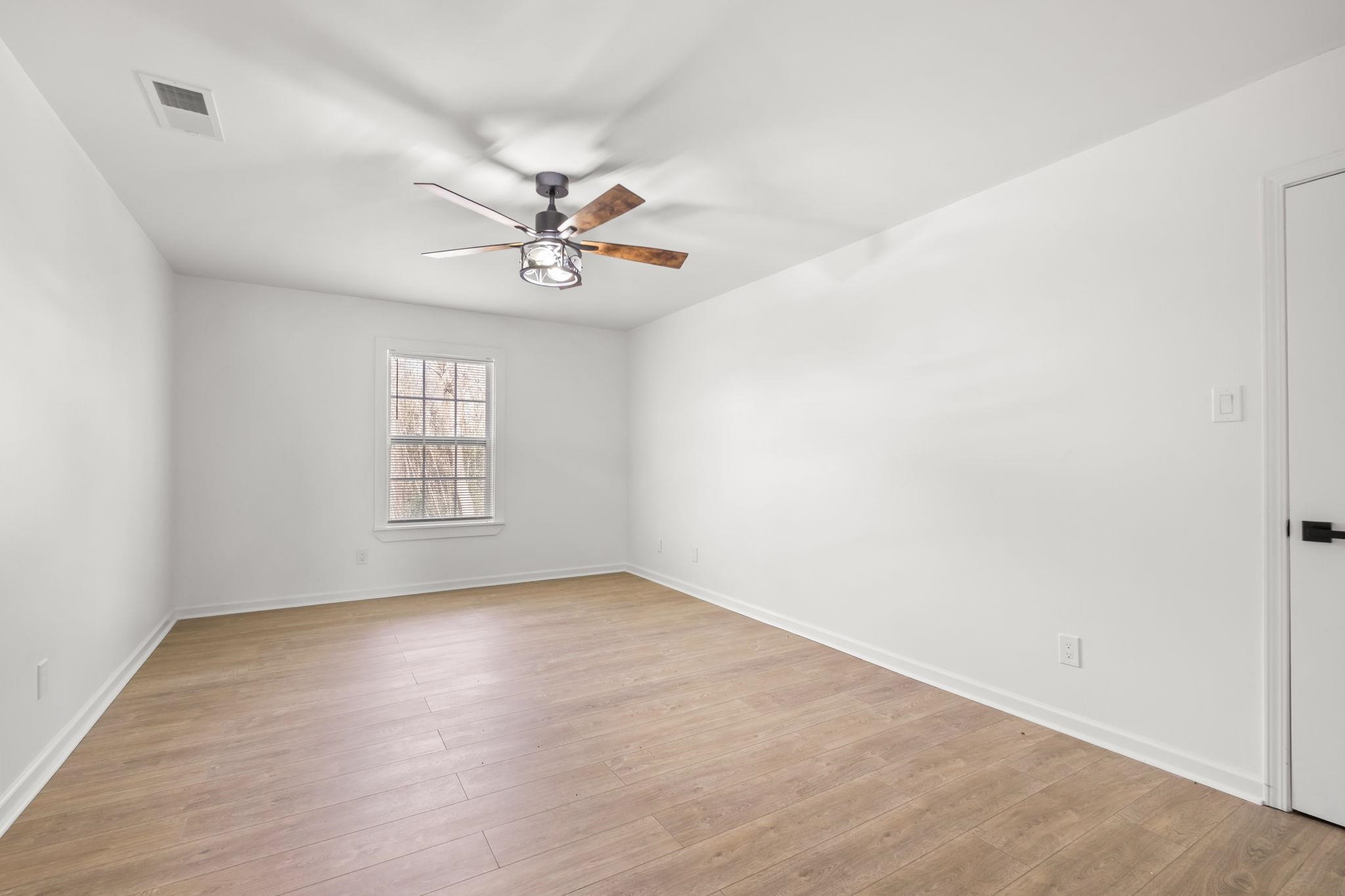 6224 Benjestown Road Memphis, TN 38127 - Photo 30 of 38 Unfurnished room featuring ceiling fan and light wood-style floors