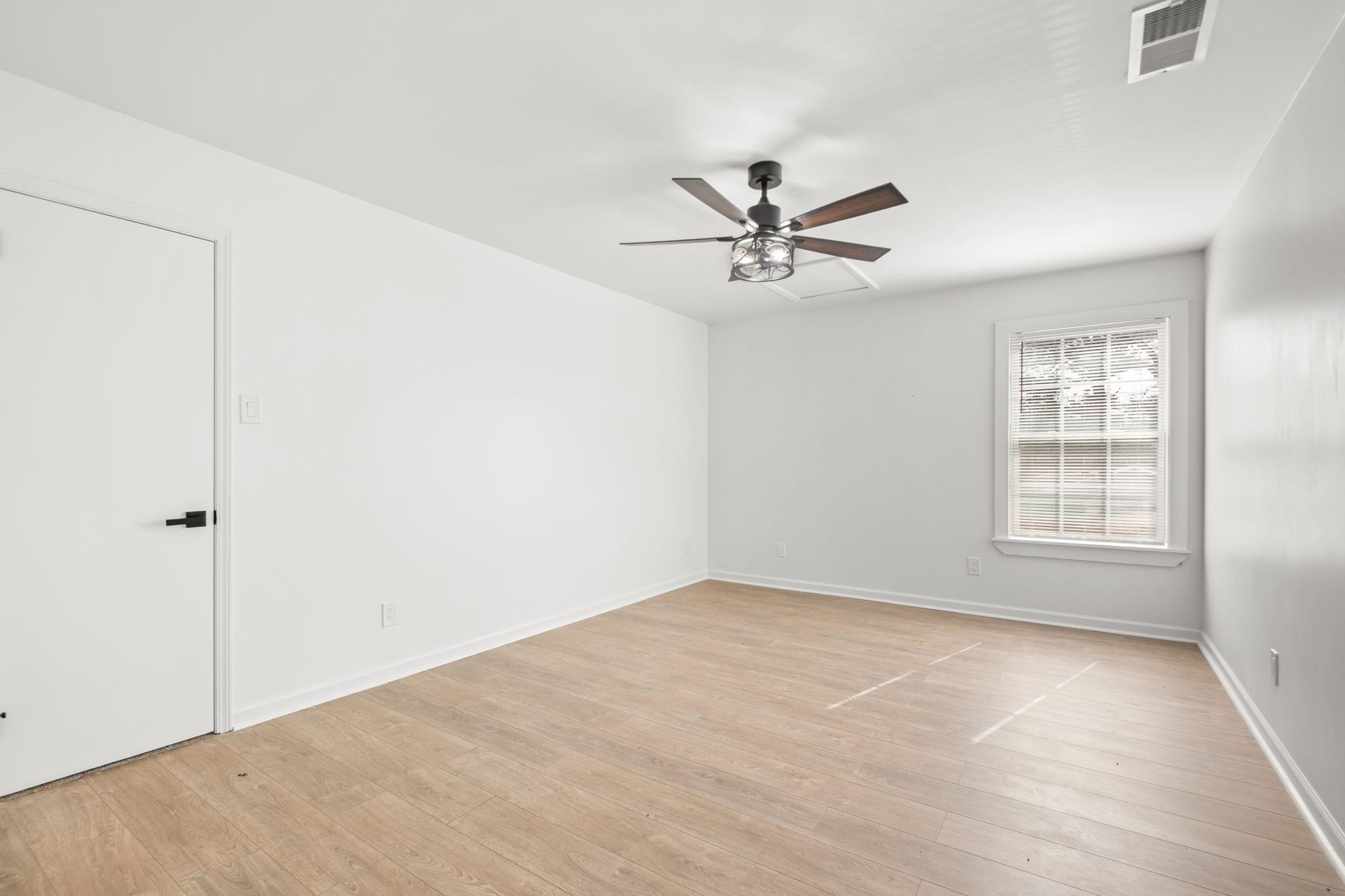 6224 Benjestown Road Memphis, TN 38127 - Photo 31 of 38 Unfurnished room with ceiling fan and light wood-style floors