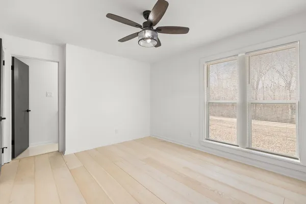 a bathroom with a sink a mirror and a shower