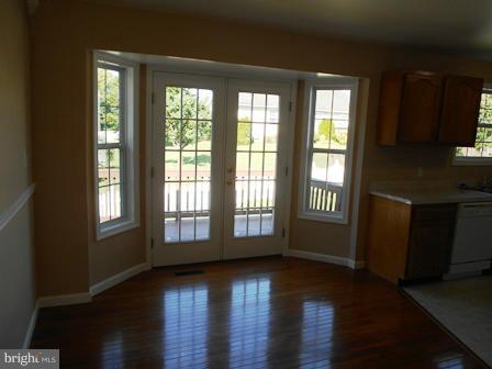 117 Michelle Drive Ranson, WV 25438 - Photo 11 of 24 a view of an empty room with wooden floor and a window