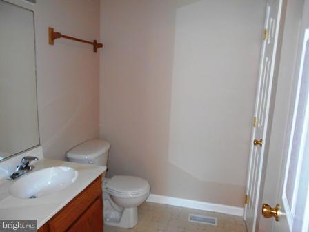 117 Michelle Drive Ranson, WV 25438 - Photo 15 of 24 a bathroom with a sink and toilet